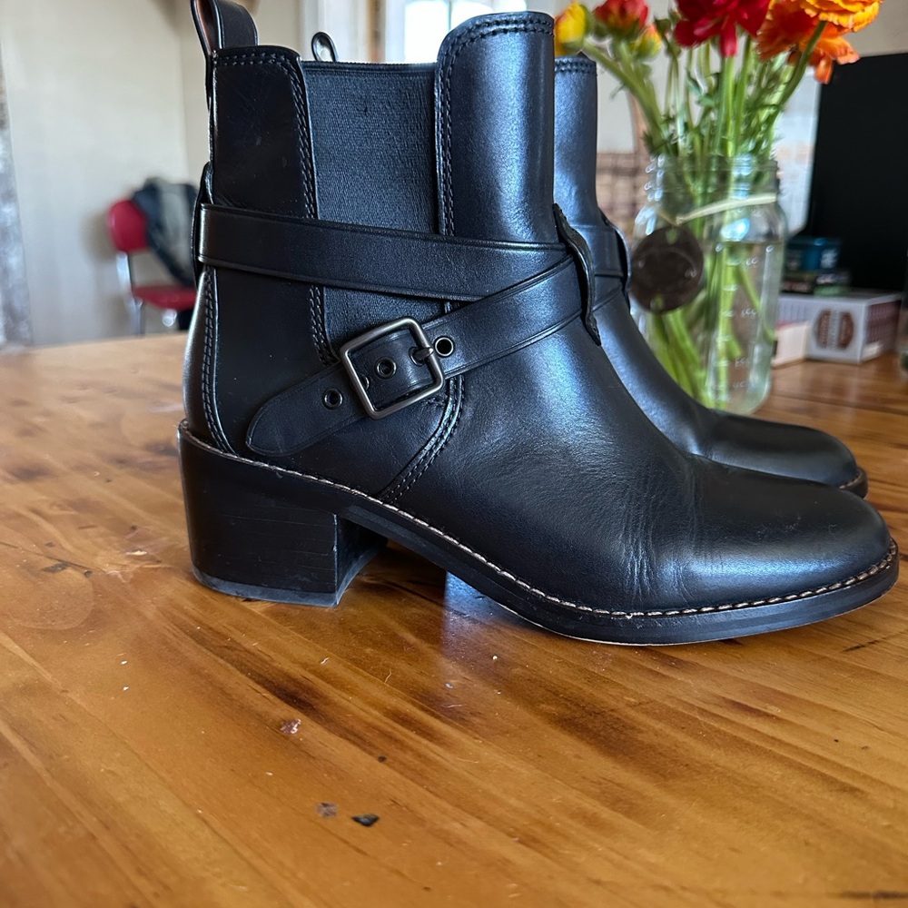 Coach women’s black Chelsea ankle boots with buckle
